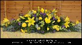 Yellow & Purple Casket Spray